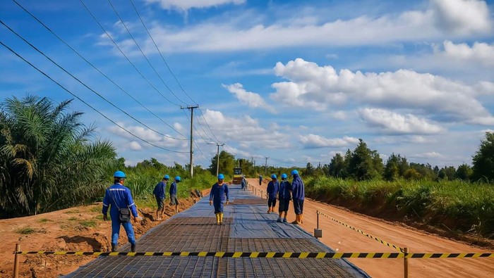 1761866595777-akses-pembangunan-jalan-yang-dilakukan-pt-oki-pulp-paper-mills-di-jalan-pasar-jetty-baung-1761835098224_169