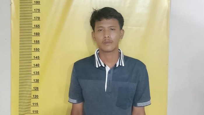 1762191517208-pelaku-saat-diamankan-di-polsek-kertapati-atas-kasus-pembunuhan-1762164445590_169