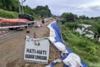 1763248787720-jalan-tergerus-longsor-1763197304274_169