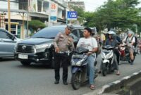 1763444228523-ilustrasi-razia-terhadap-pengendara-anak-di-bawah-umur-tak-menggunakan-helm-1763424820943_169