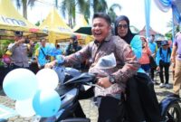 1765127135232-bantuan-motor-roda-tiga-yang-diserahkan-untuk-difabel-1765099093051_169