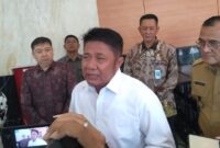 1765299931469-gubernur-sumatera-selatan-sumsel-herman-deru-1765263443432_169
