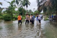 1765537570570-kondisi-banjir-di-muba-imbas-curah-hujan-tinggi-1765527270709_169