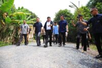 1765602338432-gubernur-sumsel-saat-berkunjung-ke-oki-1765538641321_169