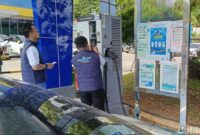 1765818361443-petugas-mengecek-spklu-di-lampung-1765790444032_169