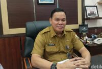 1766099093218-kepala-bkpsdm-kota-palembang-yanuarpan-yani-1766079016400_169