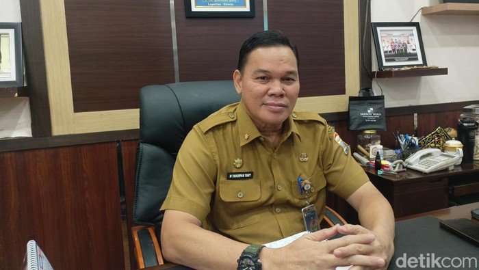 1766099093218-kepala-bkpsdm-kota-palembang-yanuarpan-yani-1766079016400_169