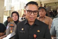 1766120812892-kepala-badan-pendapatan-daerah-bapenda-sumsel-achmad-rizan-1766049631830_169