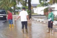 1767416790915-jalan-tergenang-di-kecamatan-gandus-palembang-1767356765424_169