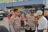 1767719160827-polisi-mendatangi-tkp-terjadinya-aksi-saling-serang-menggunakan-sajam-di-palembang-1767696964843_169