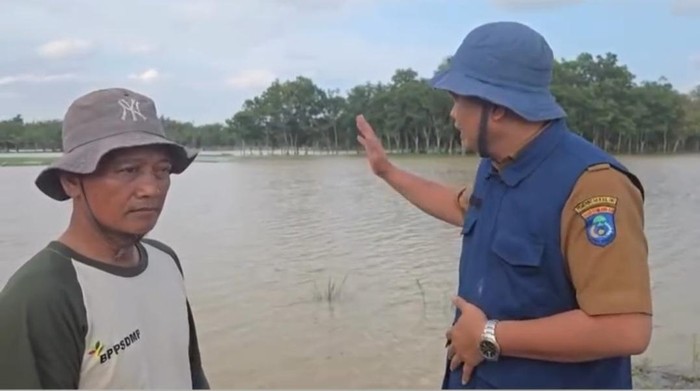 1768323962652-sawah-terendam-di-wilayah-oki-akibat-banjir-1768277769171_169